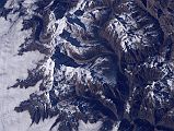 Manaslu 00 04 Nasa ISS010-E-10633 Close Up Nasa has some excellent images of Manaslu. Here is a view from the south, with Manaslu (8163m) near the top just to the left of centre with the large sunlit plateau. Moving down the image is triangular peaked Ngadi Chuli (7871m, Peak 29), and then further down and to the right Himal Chuli (7893m).